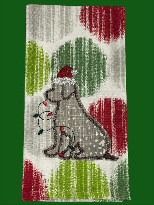 Decorative hand towel featuring embroidered dog wearing Santa hat with Christmas lights on festive red and green patterned background, perfect for holiday seasonal kitchen decor.