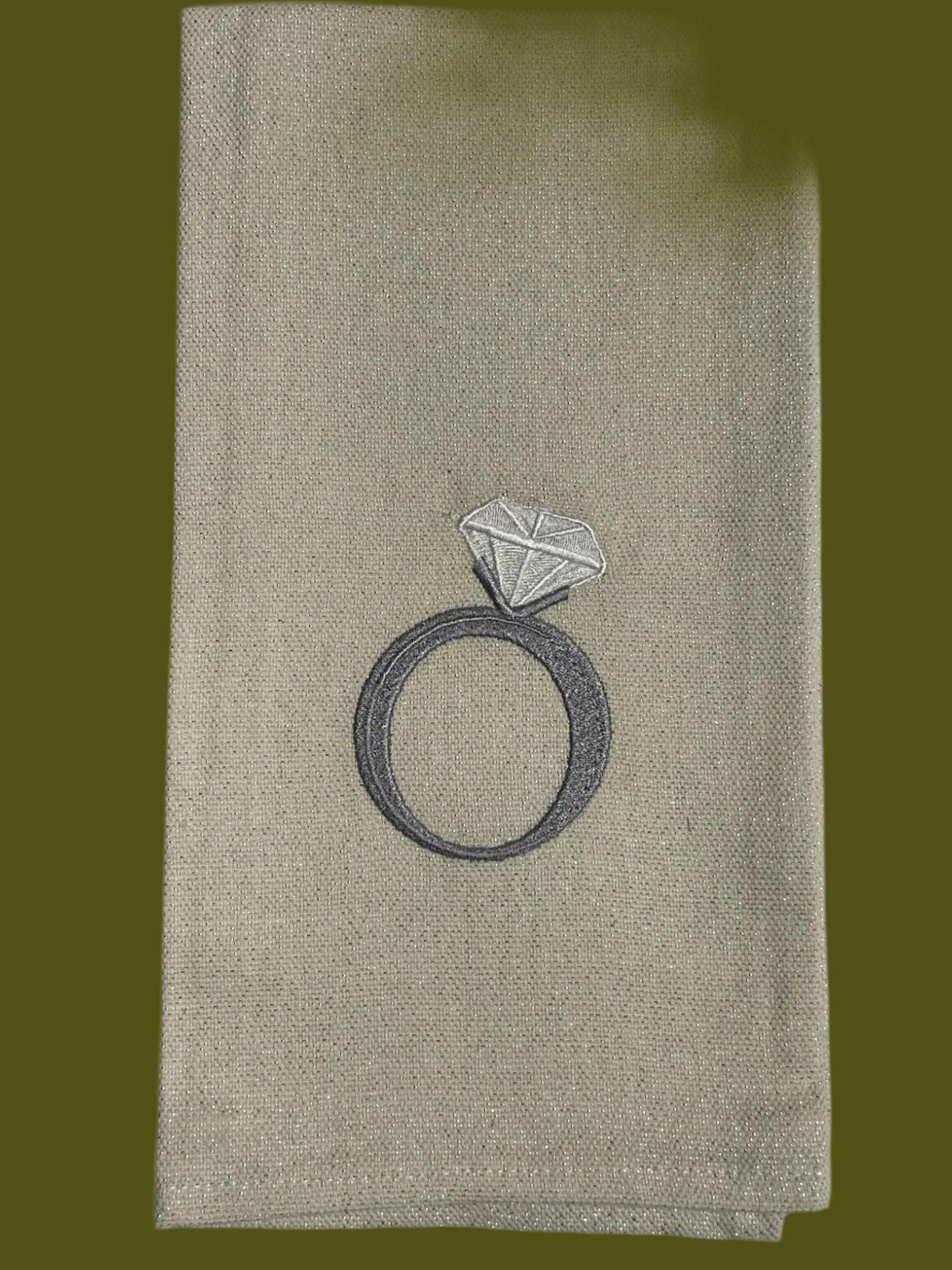 Decorative hand towel with embroidered diamond ring design, perfect for engagement or wedding gifts.