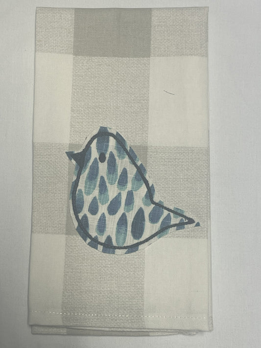 Decorative hand towel featuring embroidered single bird with blue pattern on neutral plaid background, perfect for farmhouse, spring, and everyday kitchen decor.