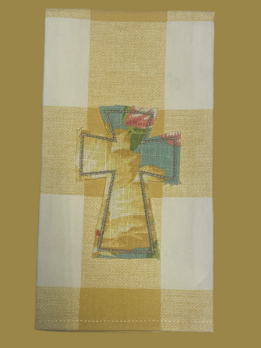Decorative hand towel featuring an embroidered cross with colorful floral pattern on yellow plaid background, perfect for spring decor, Easter gifts, or inspirational kitchen accents.
